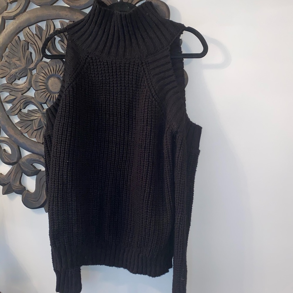 Black knit sweater with open shoulders